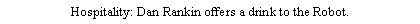 Text Box: Hospitality: Dan Rankin offers a drink to the Robot.